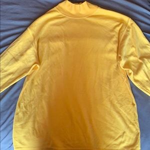 Yellow turtle neck shirt